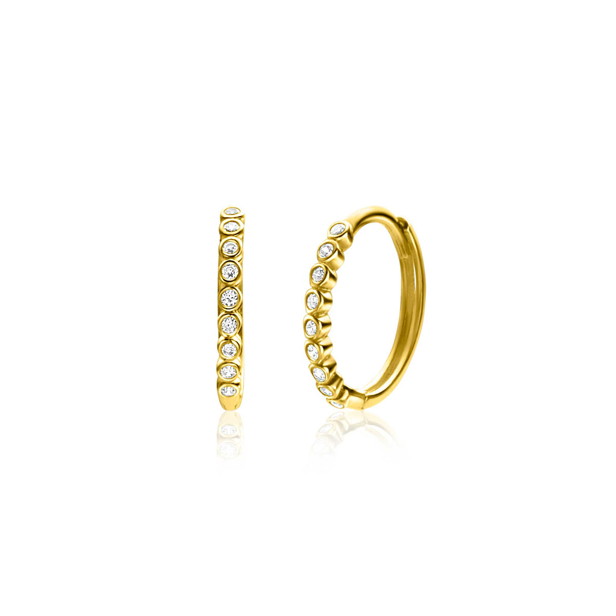 Boucles d'oreilles dorées avec des pierres brillantes disposées en ligne.