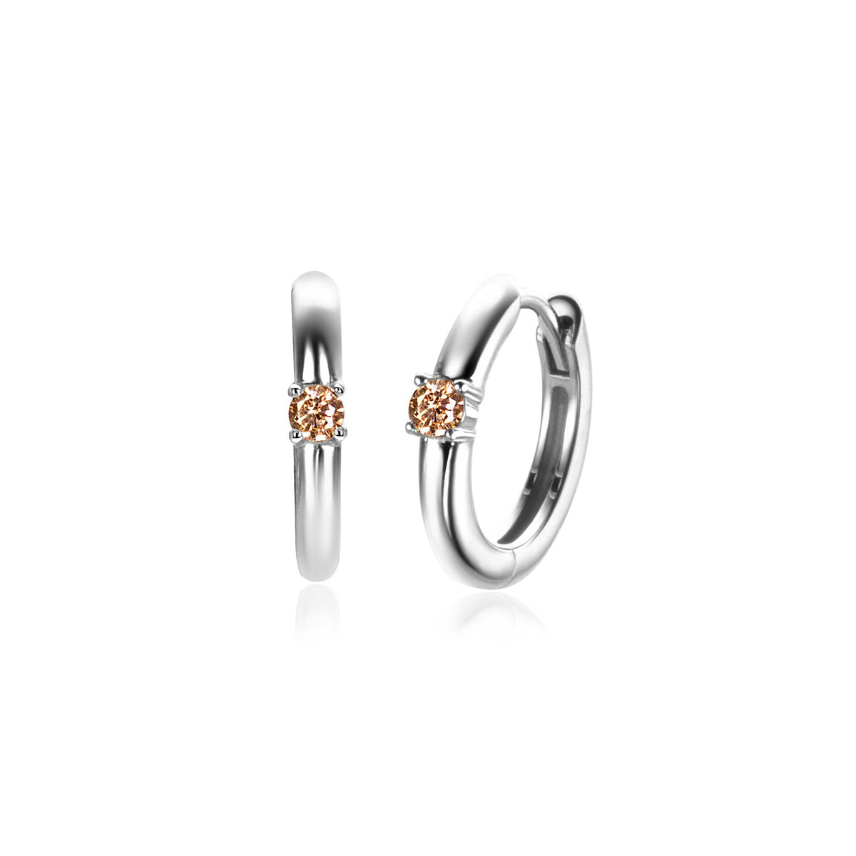 Boucles d'oreilles en argent avec un détail en rose au centre.