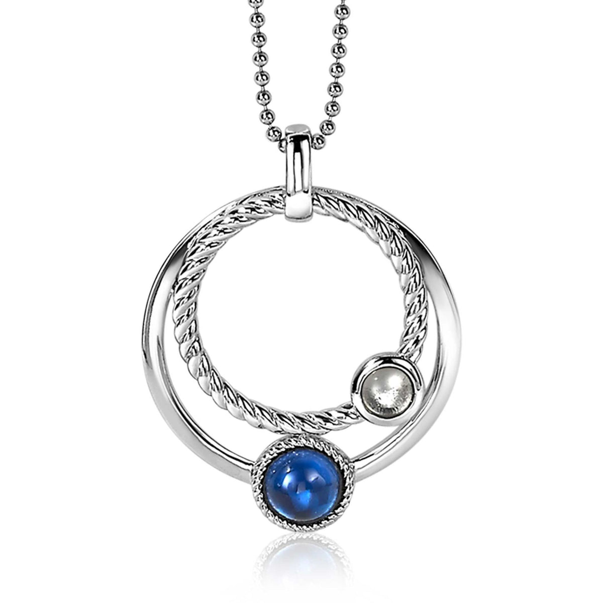 Pendentif en argent avec un design circulaire, orné d'une pierre bleue et d'une perle.