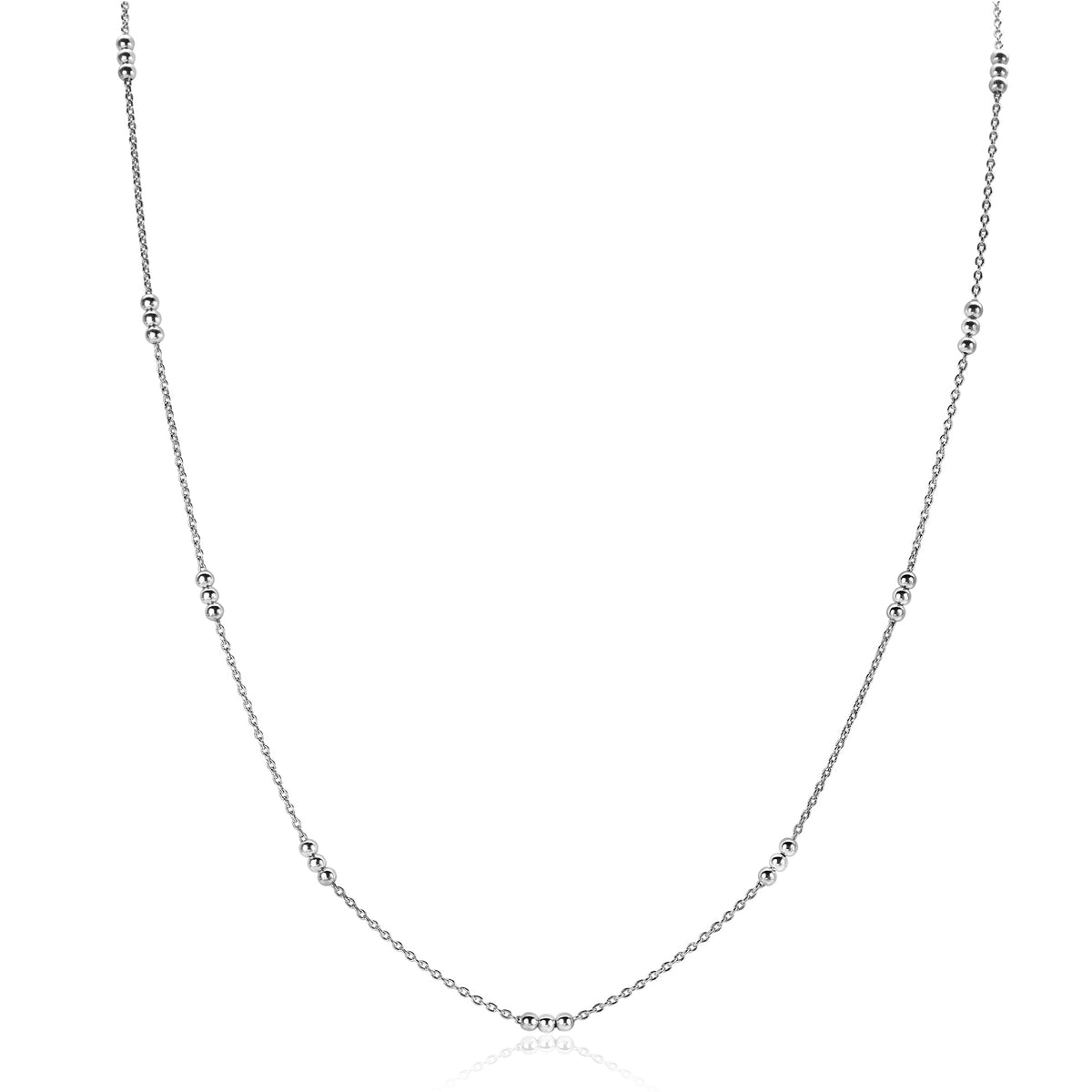 Collier en argent avec des perles espacées, finition brillante et design délicat.