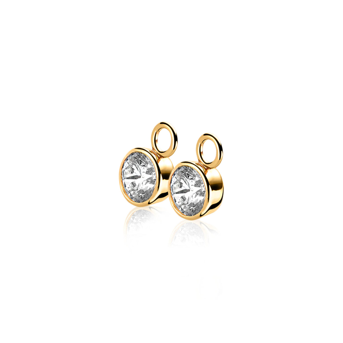 Boucles d'oreilles dorées avec un cristal transparent en forme ronde.