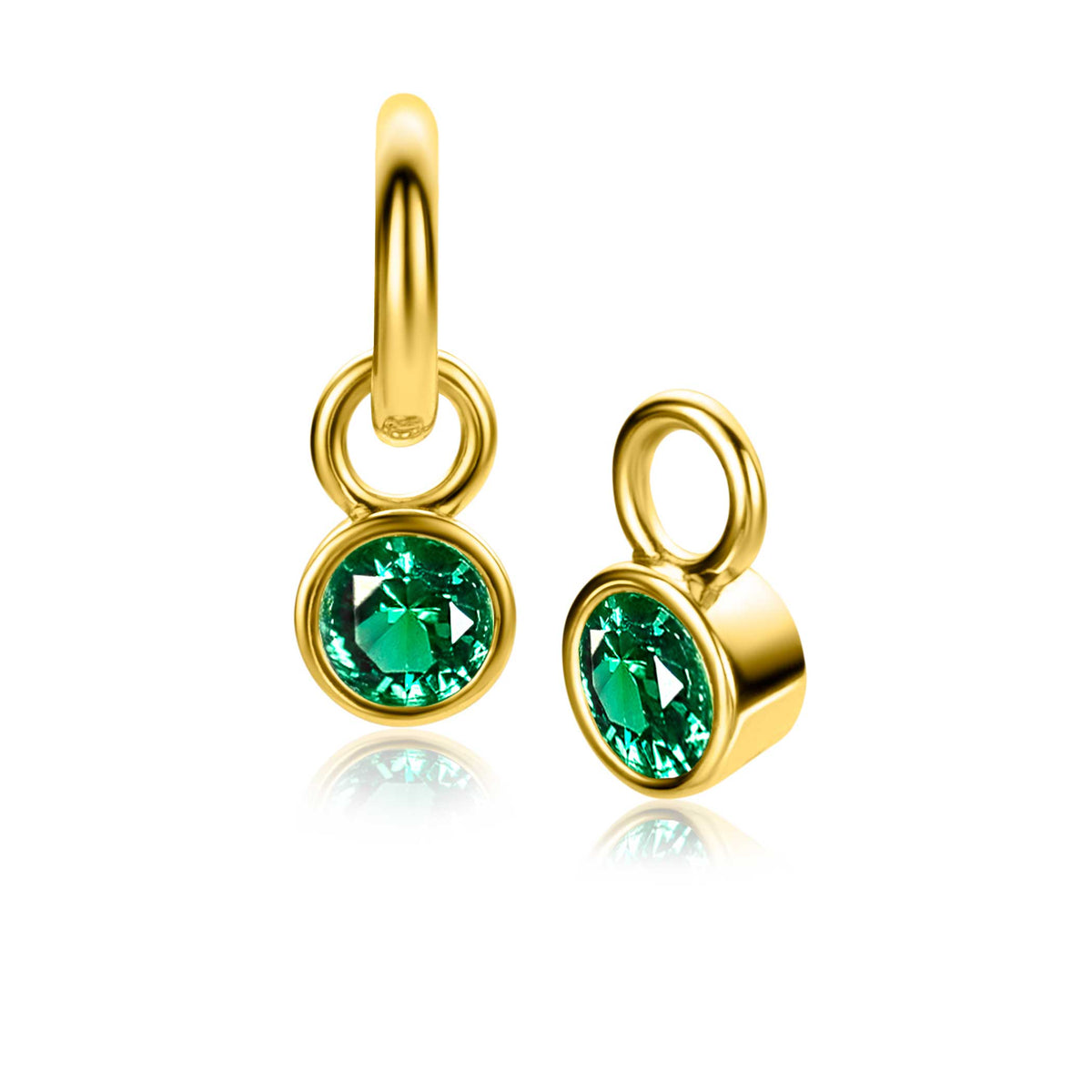 Boucles d'oreilles dorées avec un cristal vert en forme ronde.