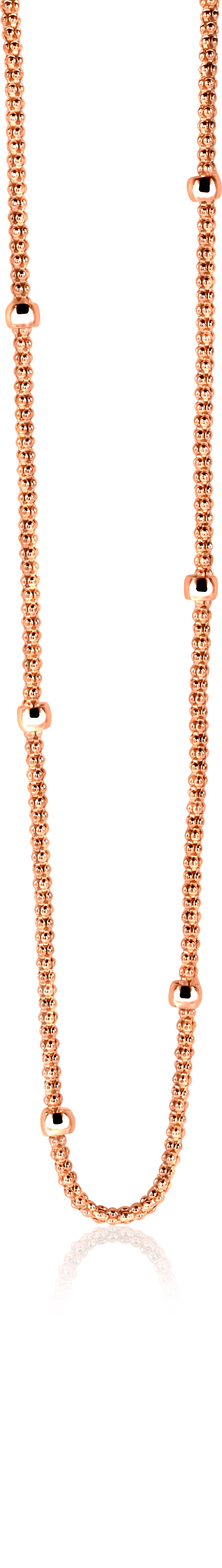 Collier doré avec des maillons ronds et des éléments espacés.