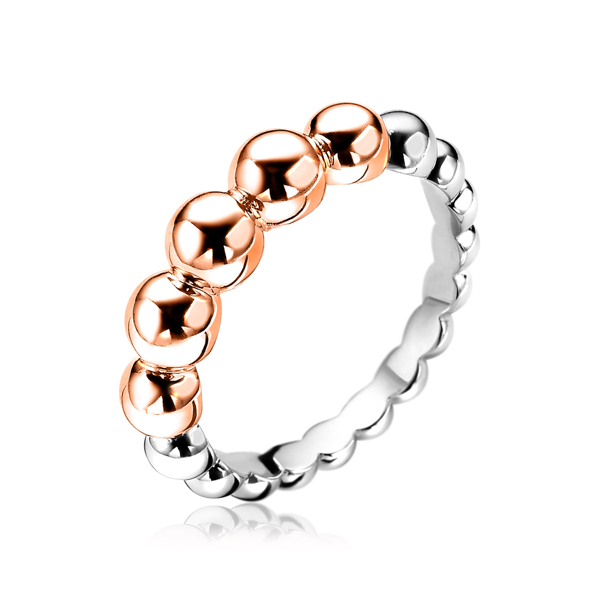 Bague dorée avec des perles en métal argenté et des détails en rose.
