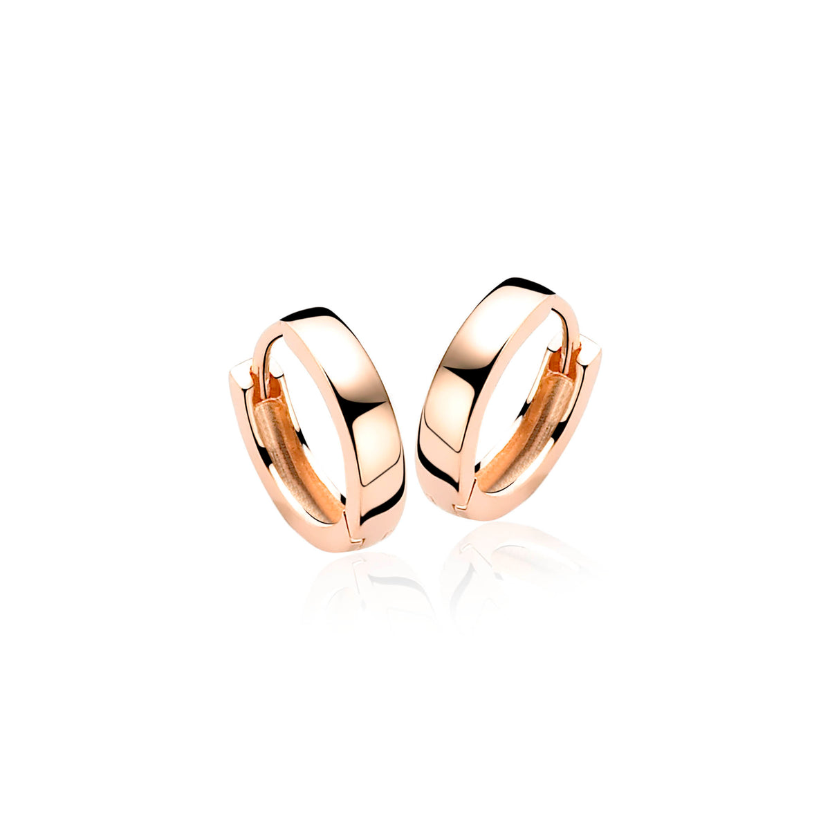 Boucles d'oreilles en plaqué or, de forme ronde et lisse, avec une finition brillante.