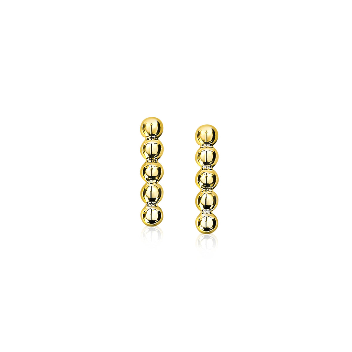 Boucles d'oreilles dorées composées de six perles alignées.