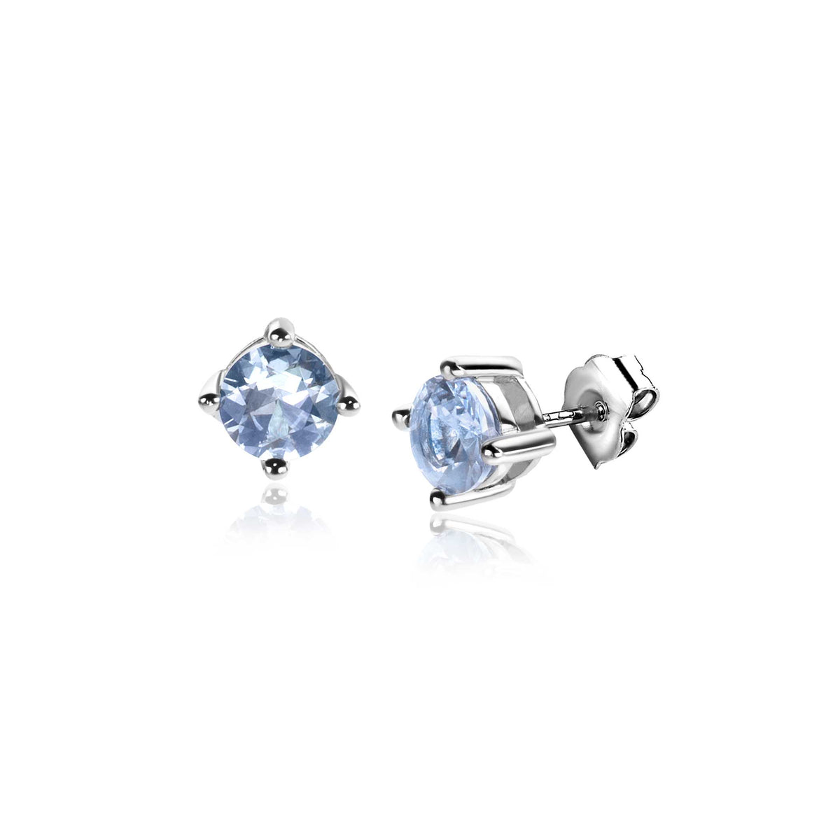 Boucles d'oreilles en argent avec des pierres bleues en forme de rond.