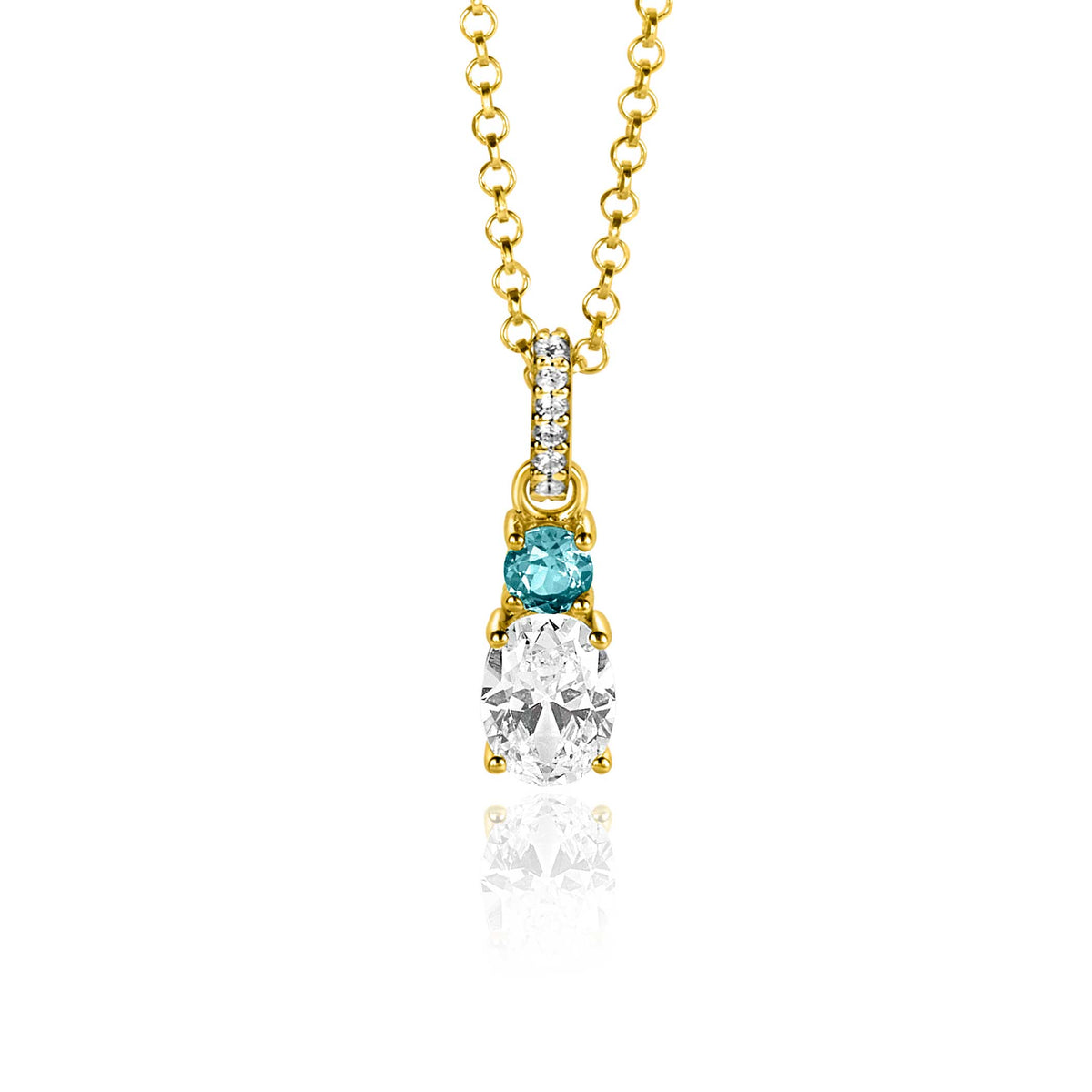 Pendentif doré avec un cristal transparent et une pierre turquoise, suspendu à une chaîne.