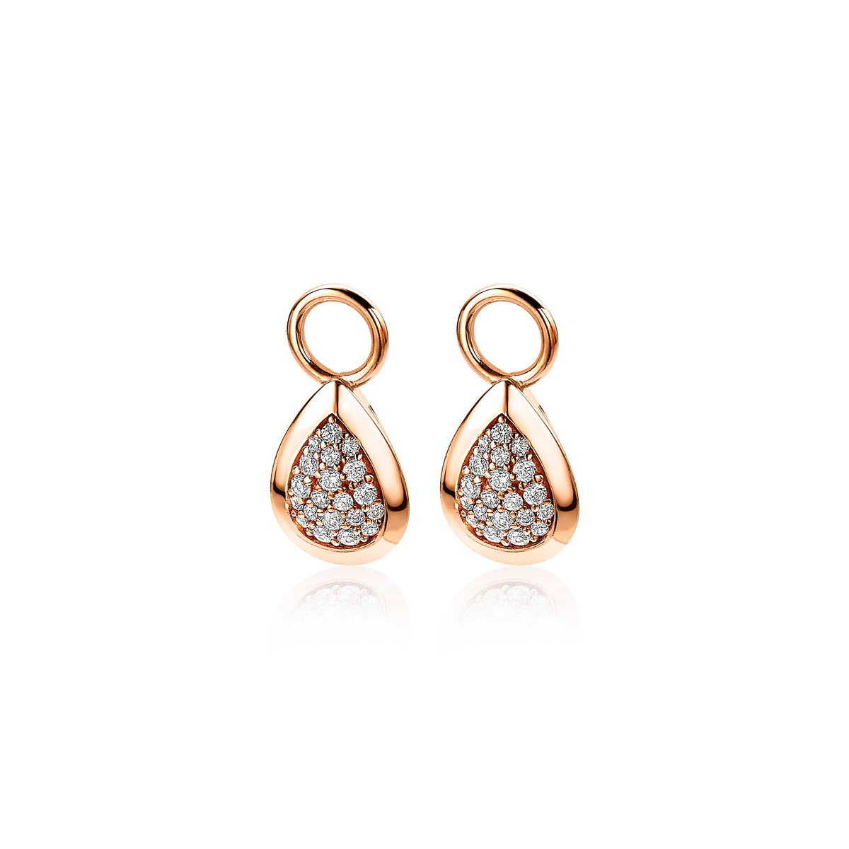 Boucles d'oreilles dorées en forme de goutte avec des pierres brillantes.