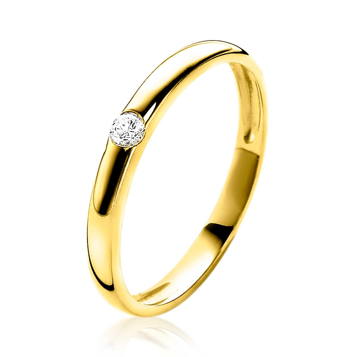 bague en or avec un diamant brillant sur le dessus