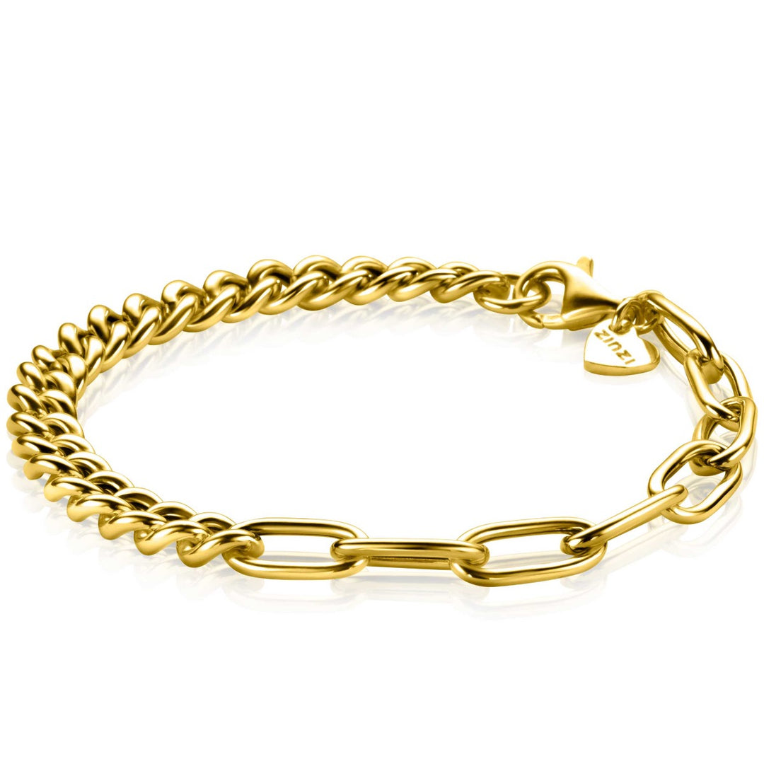 De Zinzi Armband Gold Plated Zia2285 G is een vergulde schakelarmband met dikke ovale en kleinere in elkaar grijpende schakels. Het heeft een karabijnsluiting met een hartvormige bedel en heeft een glanzende, gepolijste afwerking voor een elegante look.