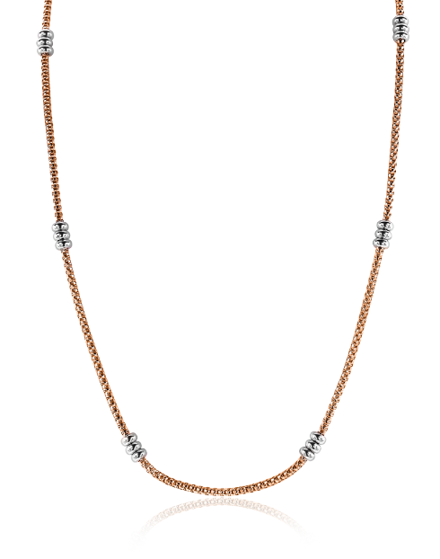Collier en argent avec des éléments en métal doré, maillons tressés et détails ronds.