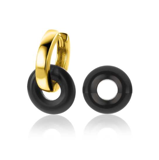 Boucles d'oreilles en métal doré avec un anneau noir en forme de donut.