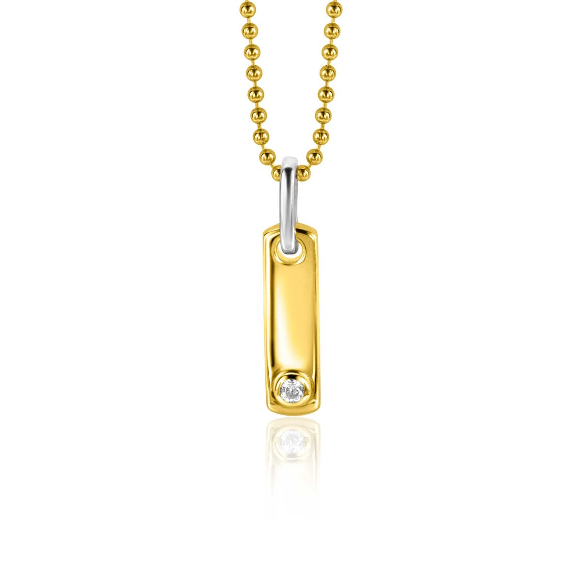 Pendentif doré avec une pierre brillante, suspendu à une chaîne à billes.