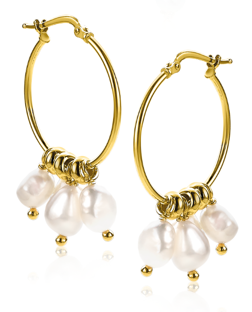 Boucles d'oreilles dorées avec perles blanches en forme de goutte.