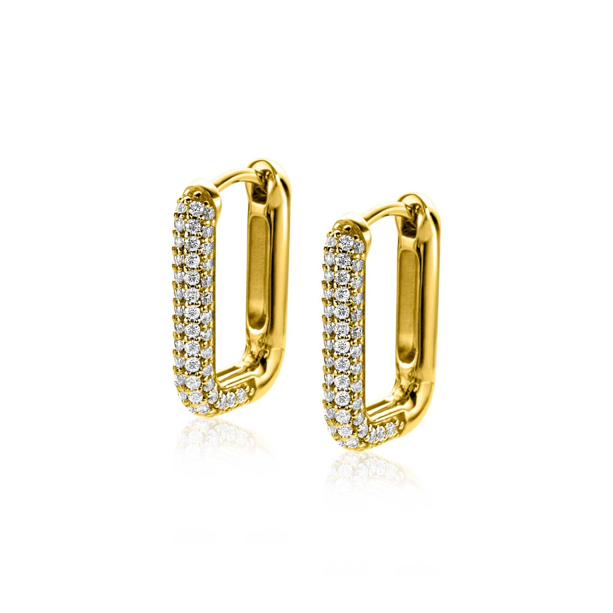 Boucles d'oreilles dorées avec des zircons scintillants en ligne.