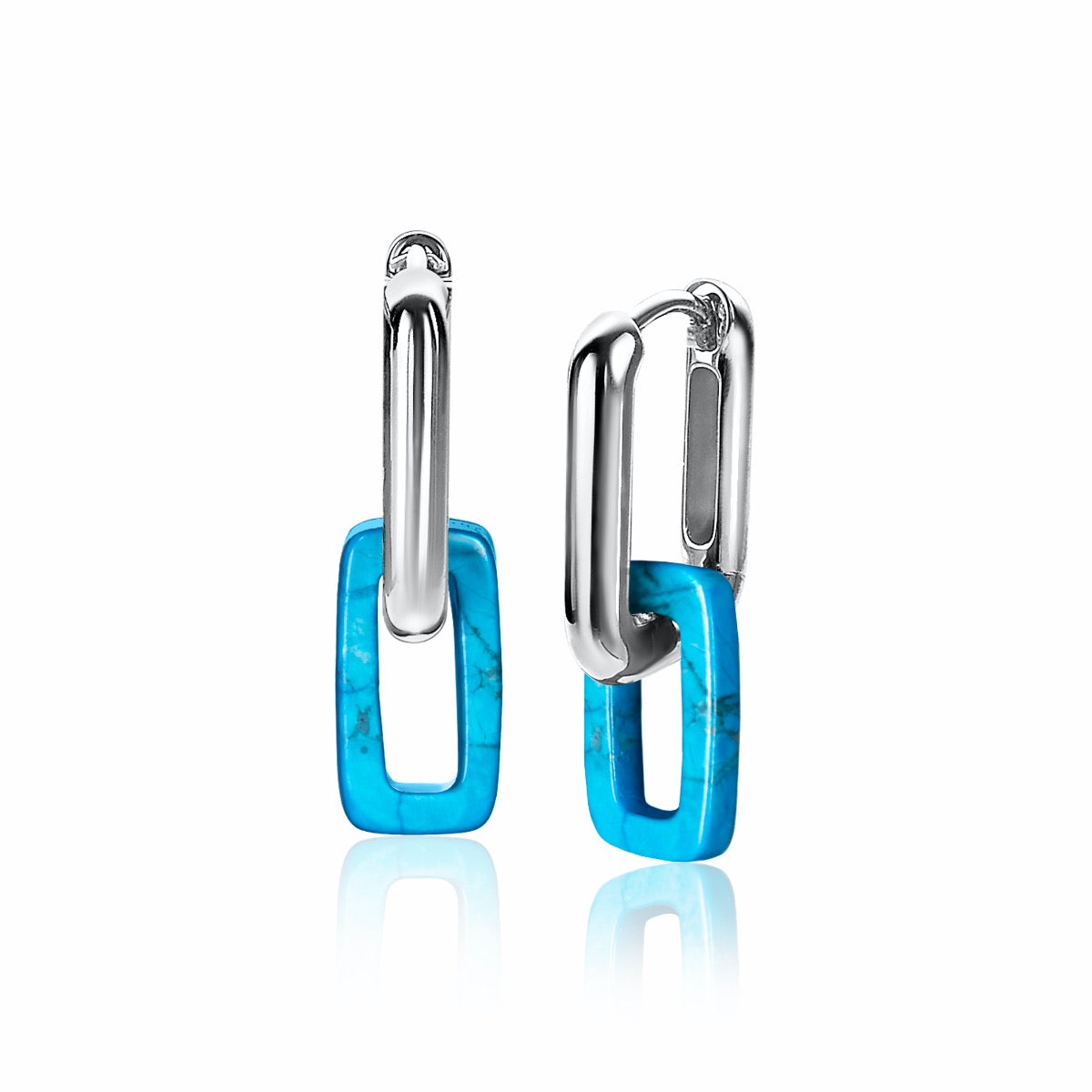 Boucles d'oreilles en argent avec des éléments en résine turquoise en forme de rectangle.