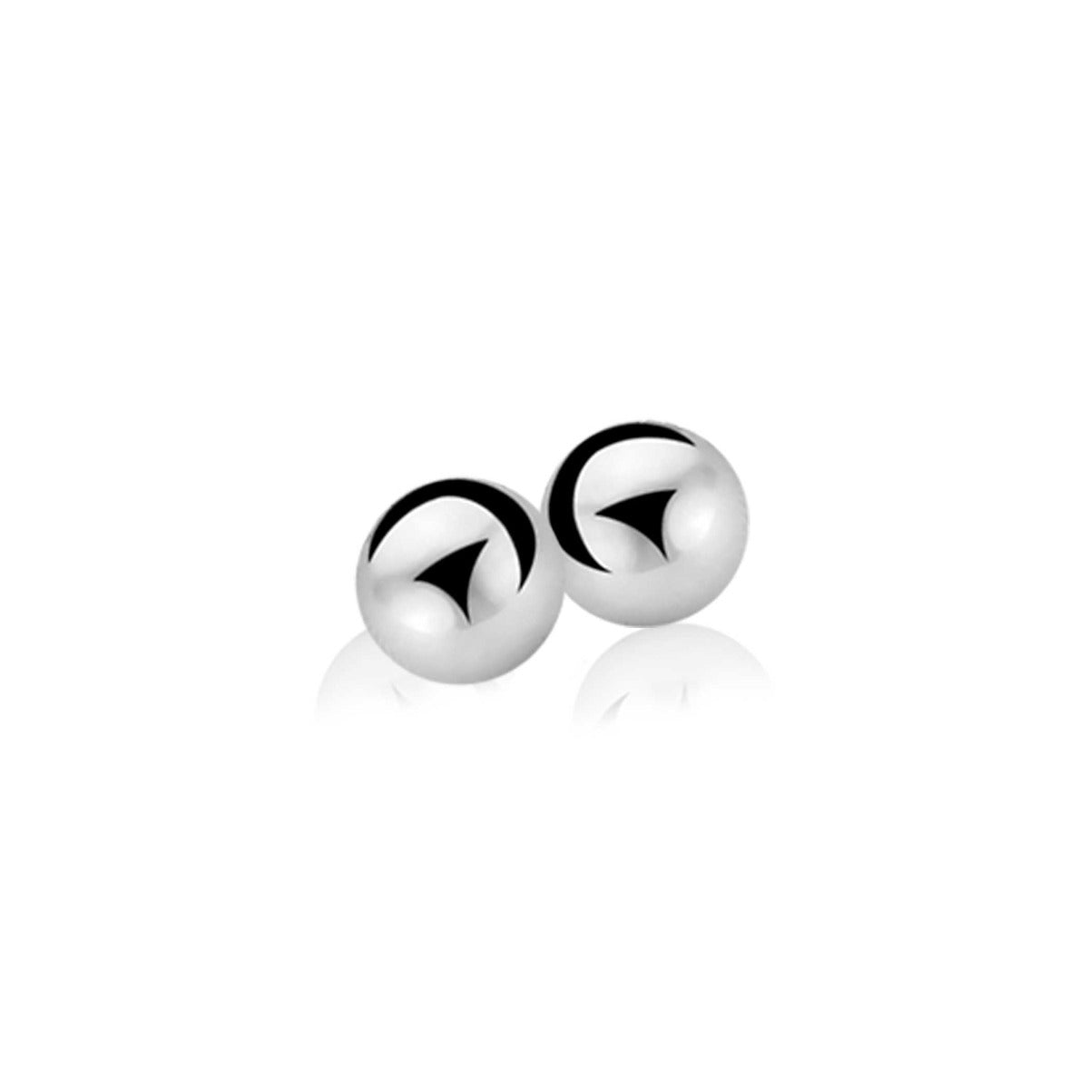 Boucles d'oreilles en argent avec un design sphérique et des motifs en relief.