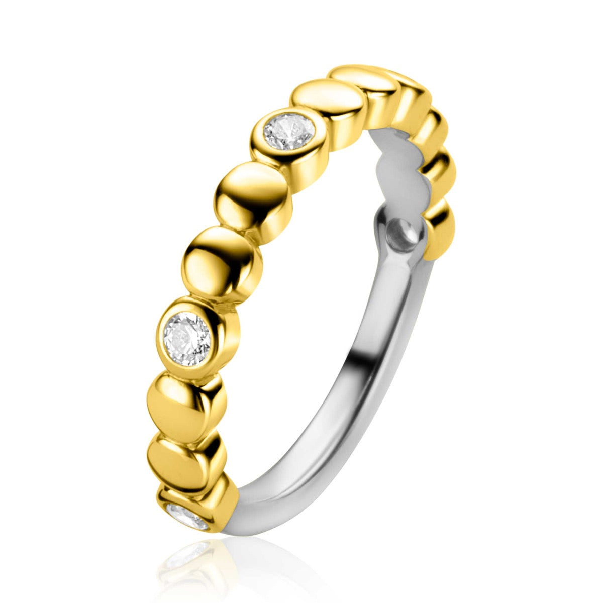 Bague dorée avec des éléments en forme de goutte et des zircons.